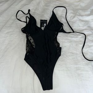 Black one piece bathing suit never worn!